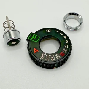 MINOLTA X-700 SHUTTER SPEED SELECTOR COVER WITH RELEASE BUTTON
